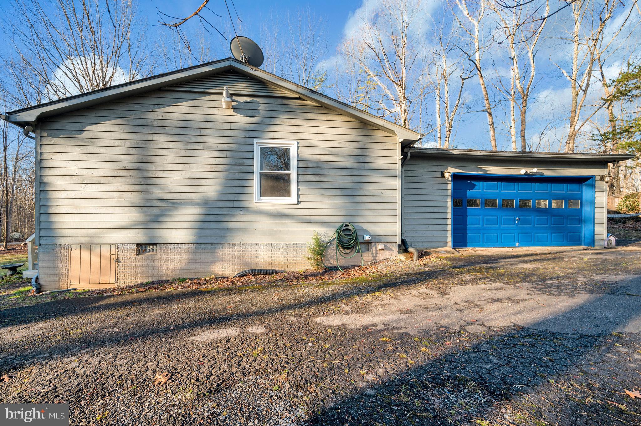 12402 Toll House Road Spotsylvania, VA 22551 - Photo 57 of 59 a front view of a house with a yard