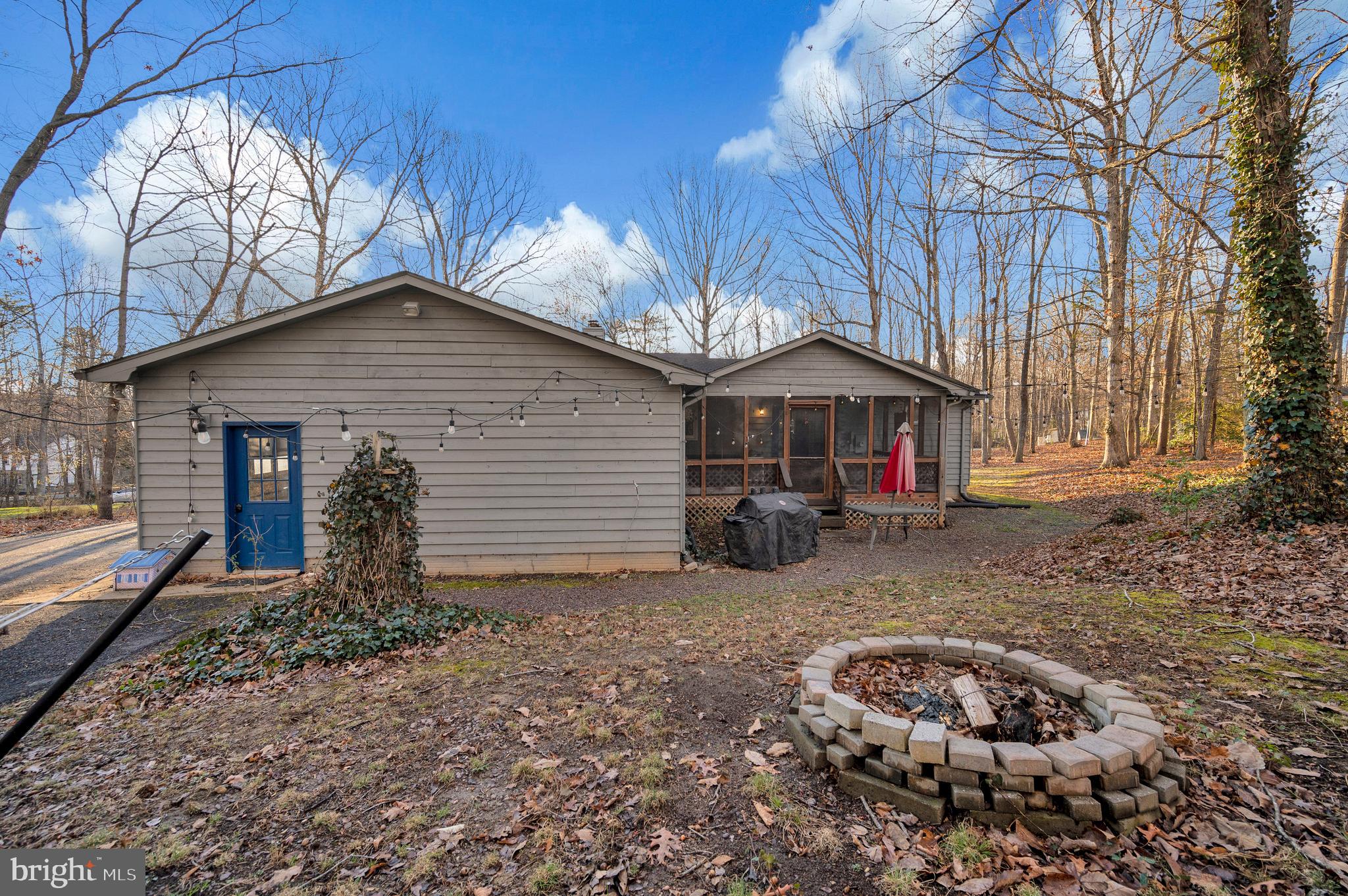 12402 Toll House Road Spotsylvania, VA 22551 - Photo 58 of 59 a front view of a house with garden