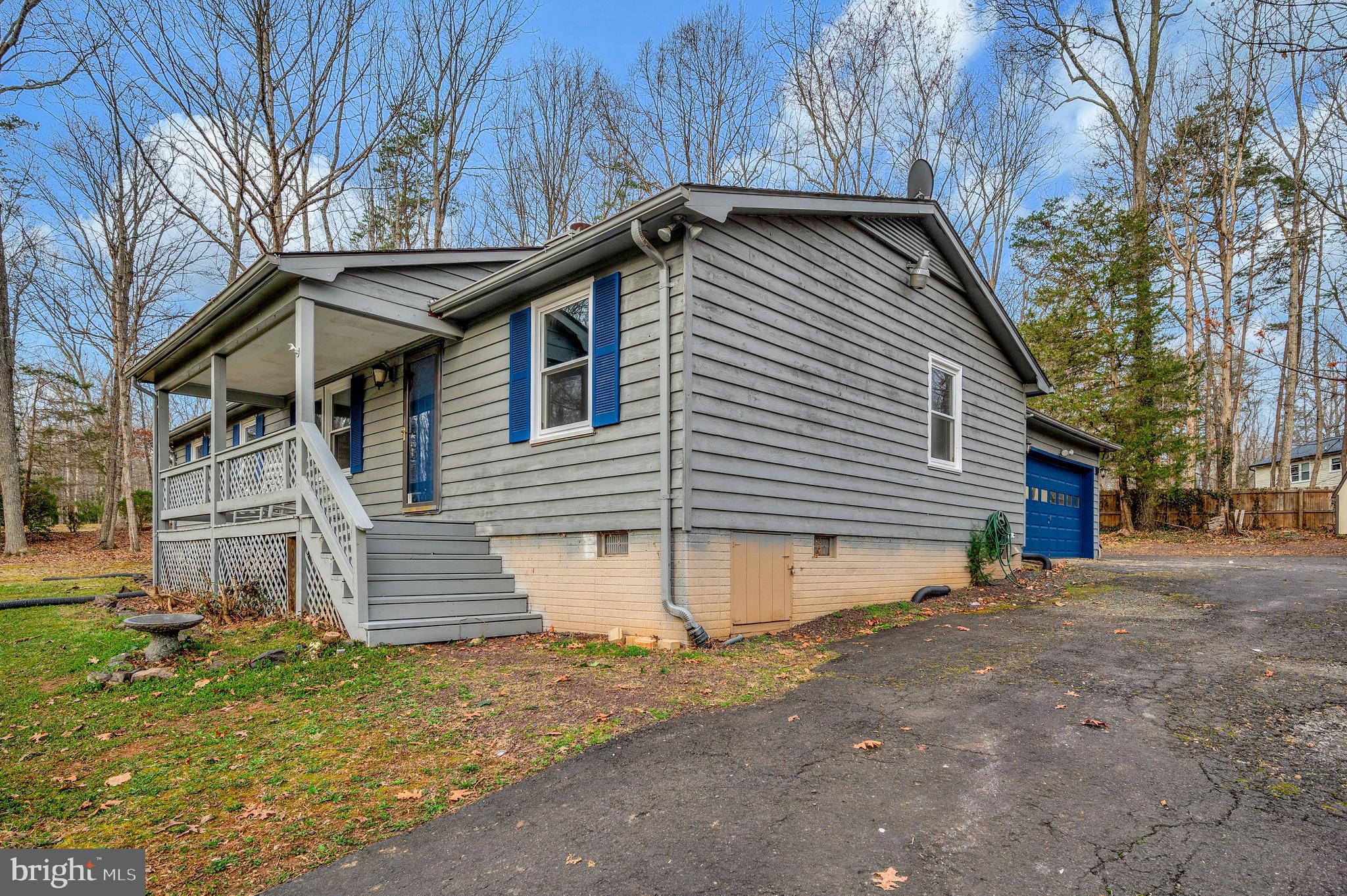 12402 Toll House Road Spotsylvania, VA 22551 - Photo 7 of 59 a view of a house with a yard