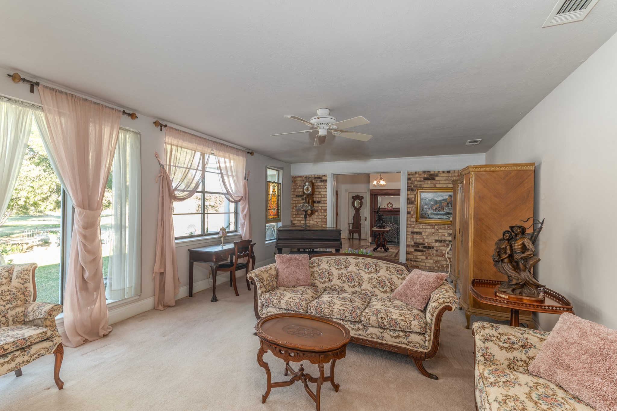 6184 Farm To Market 485 Cameron, TX 76520 - Photo 13 of 34 a living room with furniture and a large window