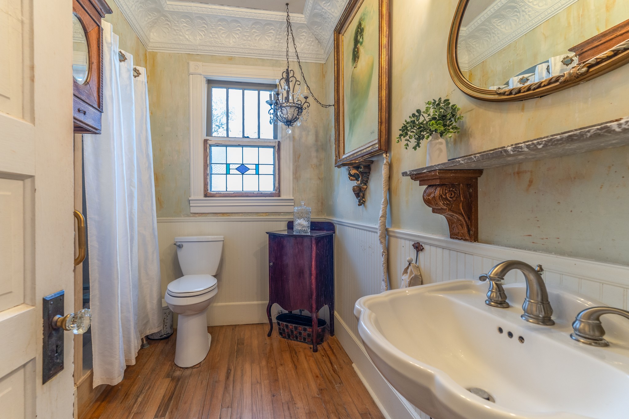 6184 Farm To Market 485 Cameron, TX 76520 - Photo 18 of 34 a bathroom with a sink and a mirror