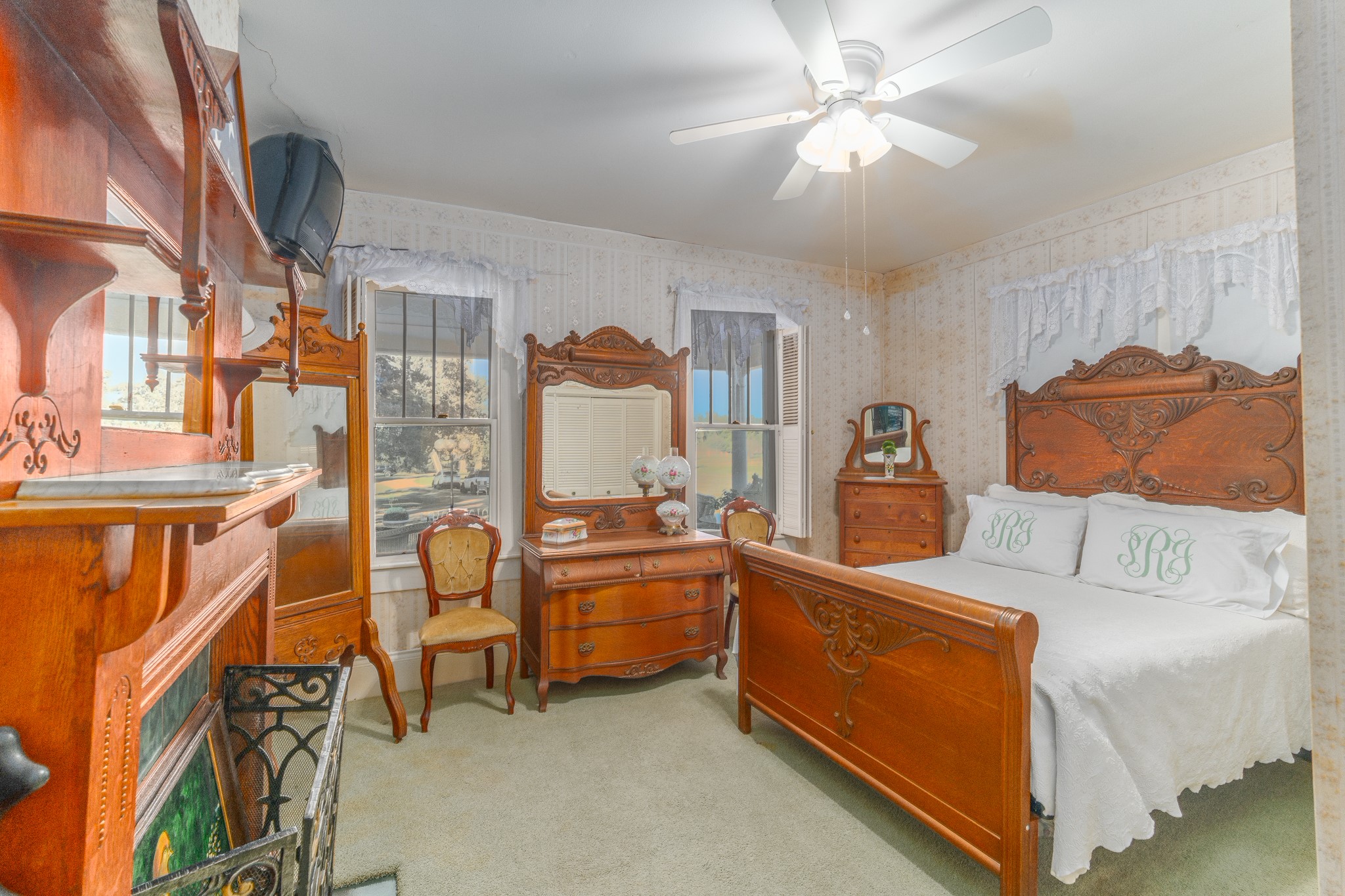 6184 Farm To Market 485 Cameron, TX 76520 - Photo 19 of 34 a bedroom with furniture and a chandelier