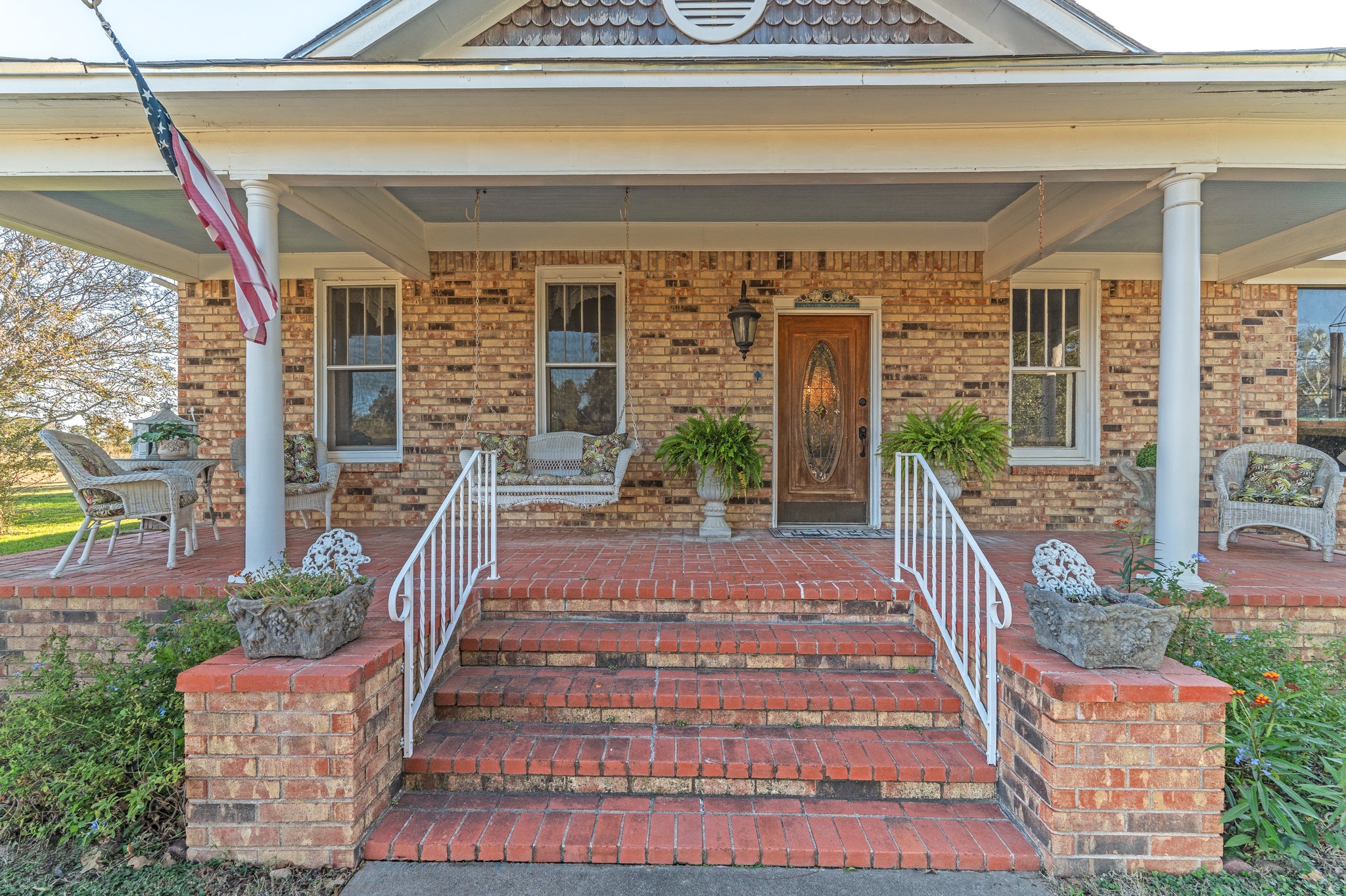 6184 Farm To Market 485 Cameron, TX 76520 - Photo 2 of 34 a front view of a house with a porch