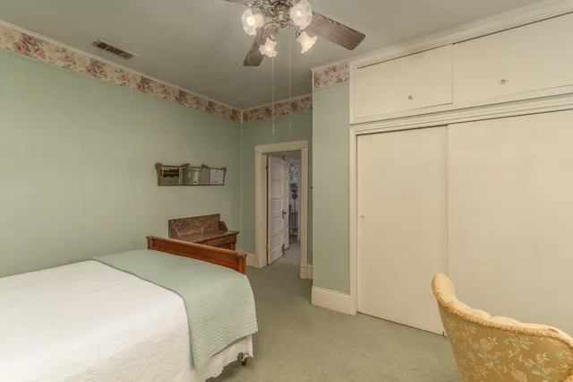 a large kitchen with stainless steel appliances granite countertop a sink and cabinets