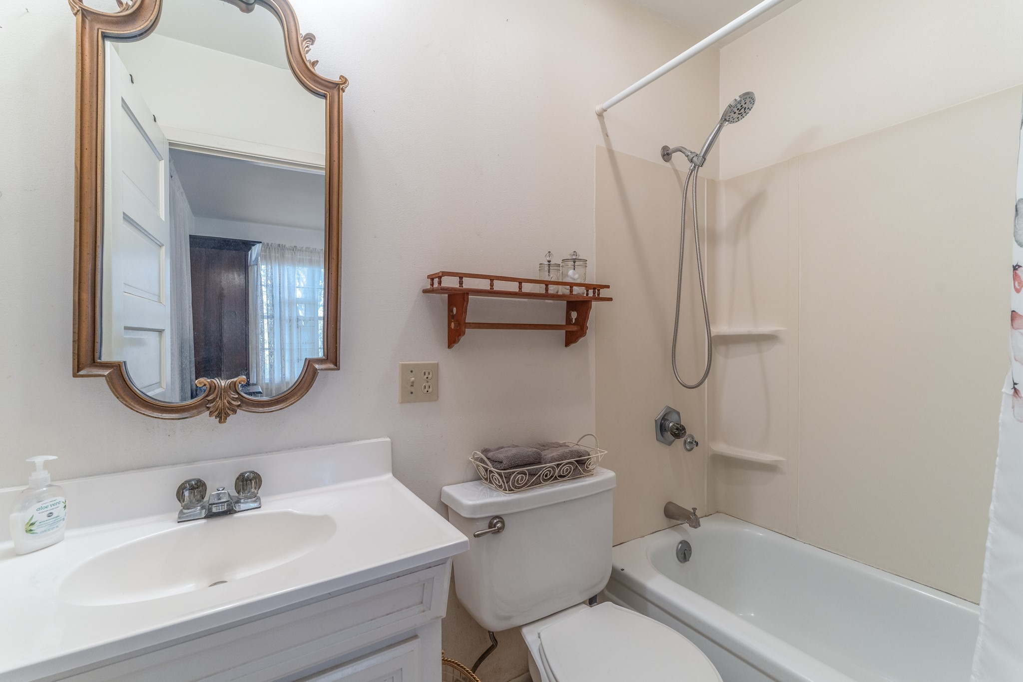 6184 Farm To Market 485 Cameron, TX 76520 - Photo 25 of 34 a bathroom with a sink a toilet and a bathtub