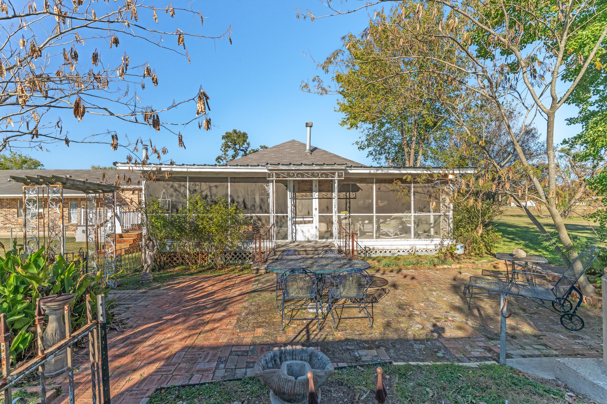 6184 Farm To Market 485 Cameron, TX 76520 - Photo 9 of 34 a view of a house with backyard and sitting area