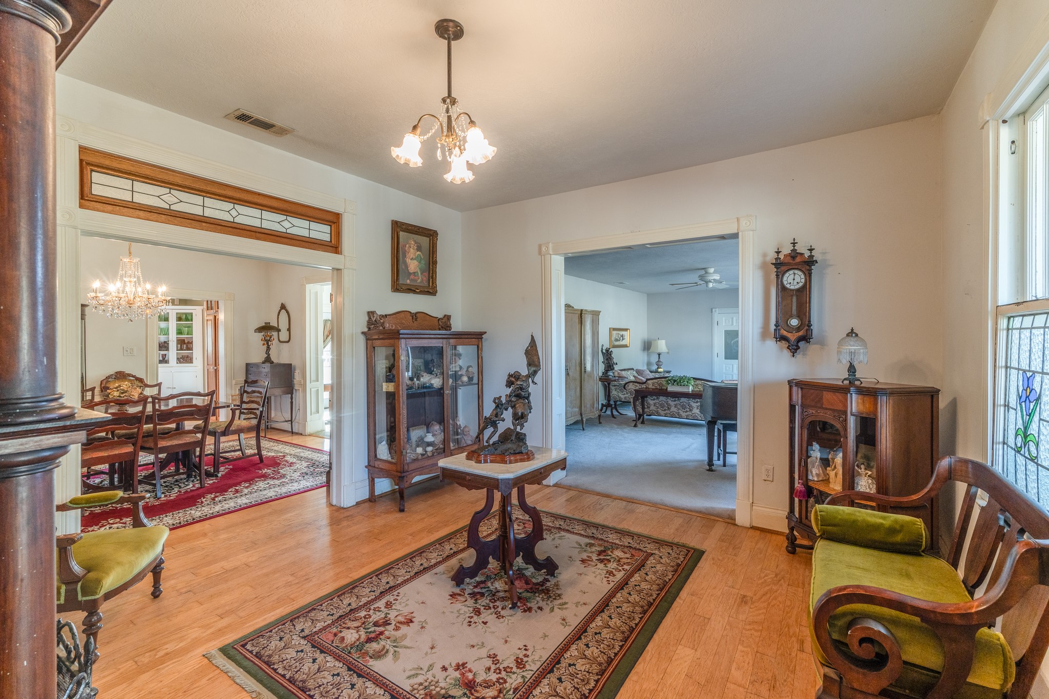 6184 Farm To Market 485 Cameron, TX 76520 - Photo 10 of 34 a living room with furniture and a chandelier