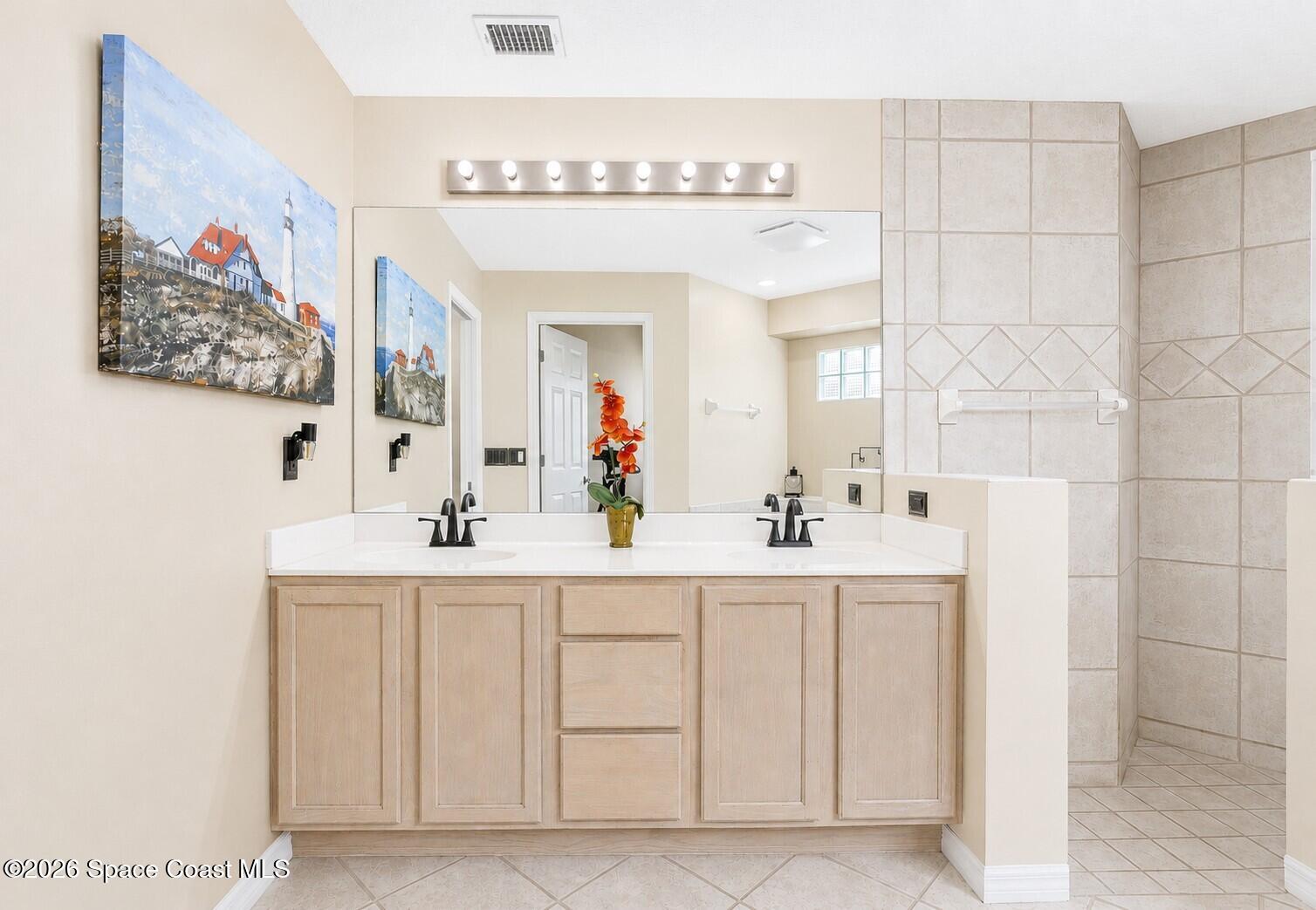 1697 Atrium Drive Melbourne, FL 32935 - Photo 20 of 36 Primary Bath Vanity