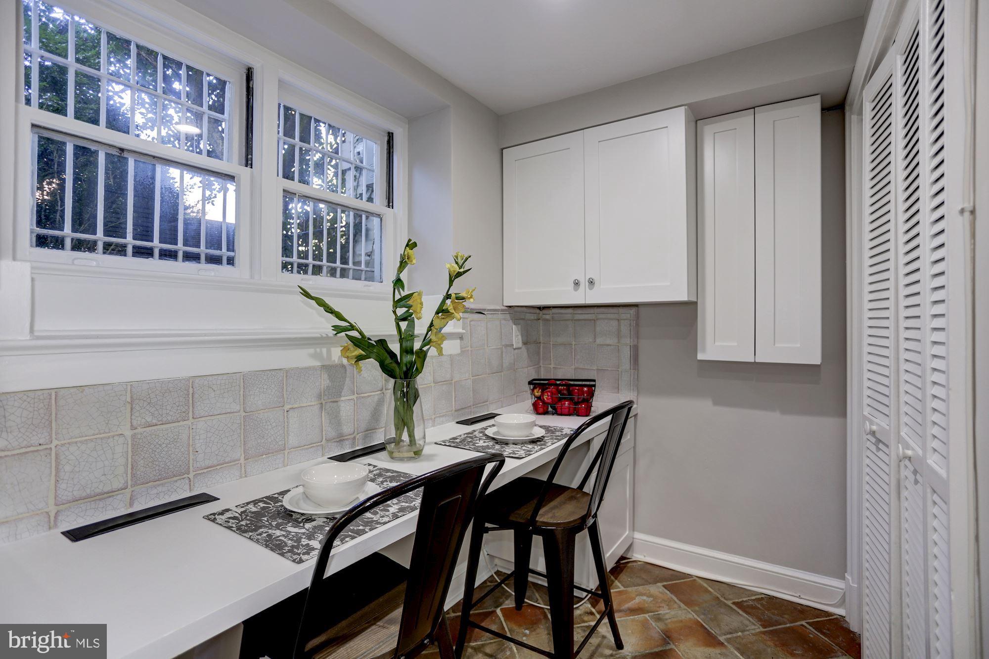 3306 R Street Northwest Washington, DC 20007 - Photo 21 of 38 Space to eat-in + connections for laptop/computer