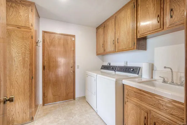 a big room with furniture and a flat screen tv