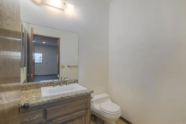 a view of empty room with front door