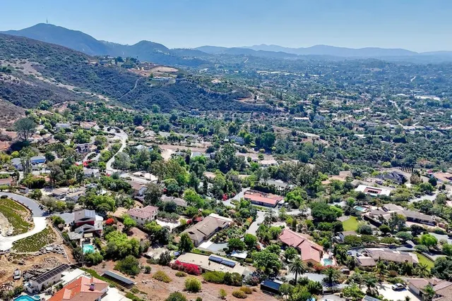 an aerial view of town and residential houses