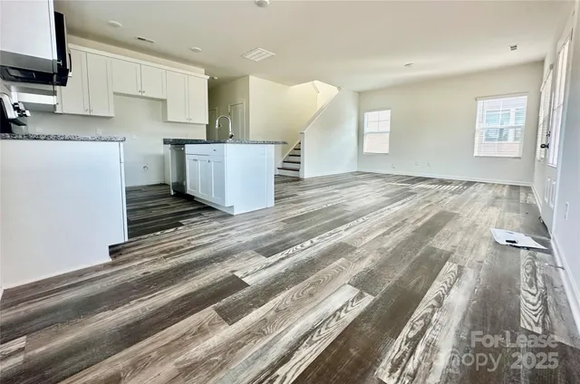 a view of kitchen and sink