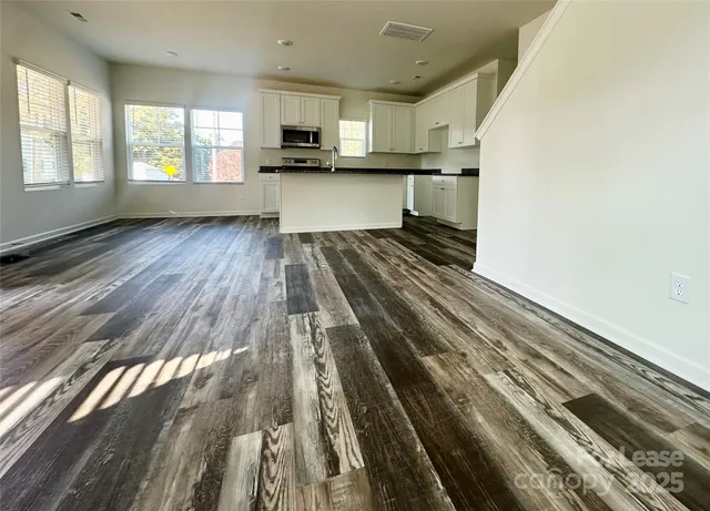 a view of kitchen and microwave