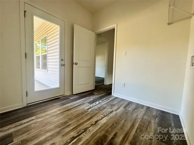 a view of an empty room and window