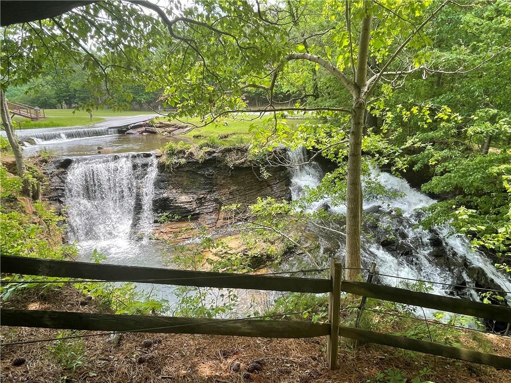 1225 Oglethorpe Road Jasper, GA 30143 - Photo 1 of 37 a view of a lake from a balcony