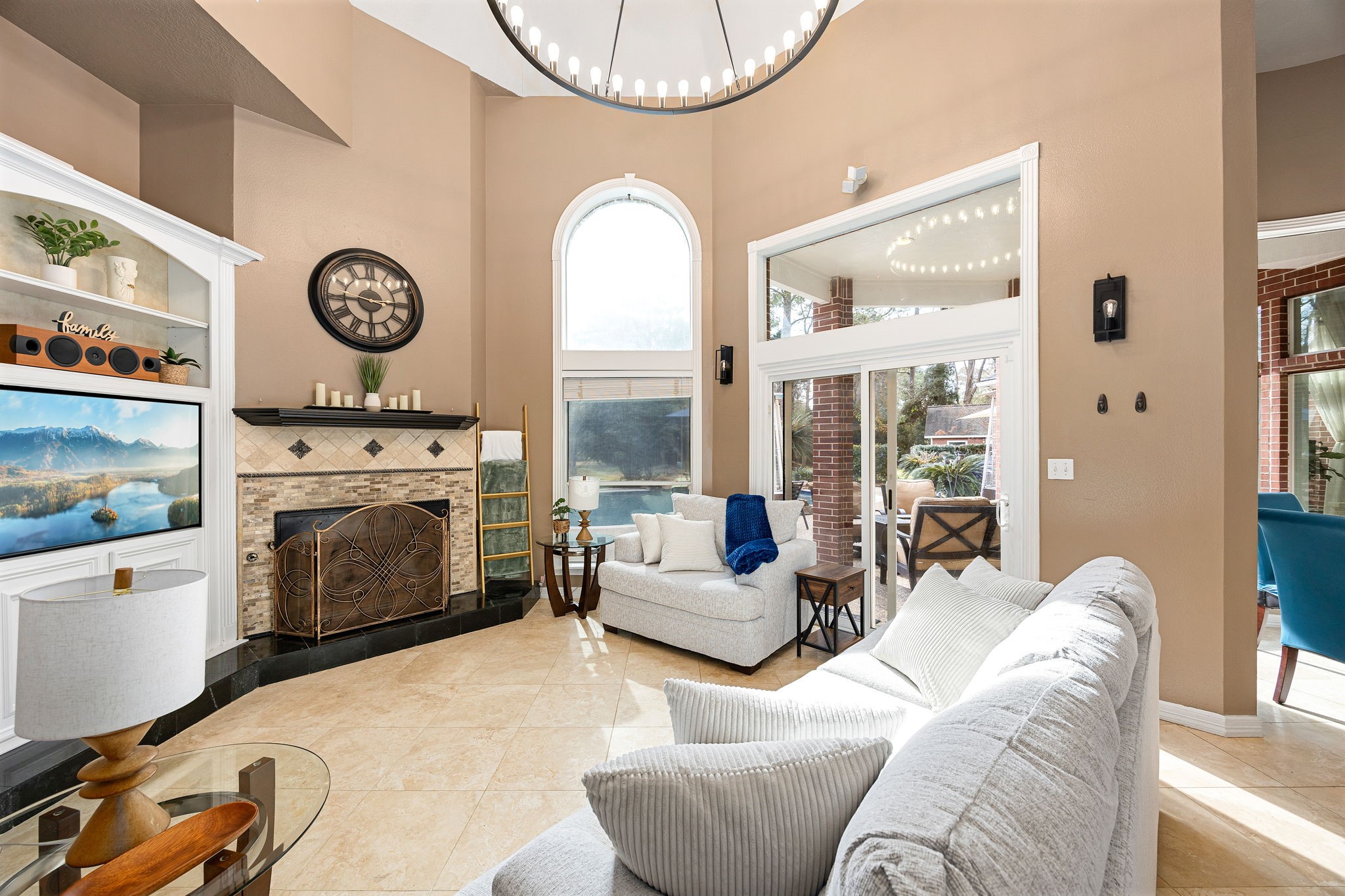 17511 Hawkin Lane Tomball, TX 77377 - Photo 19 of 50 a living room with furniture a large window and a fireplace