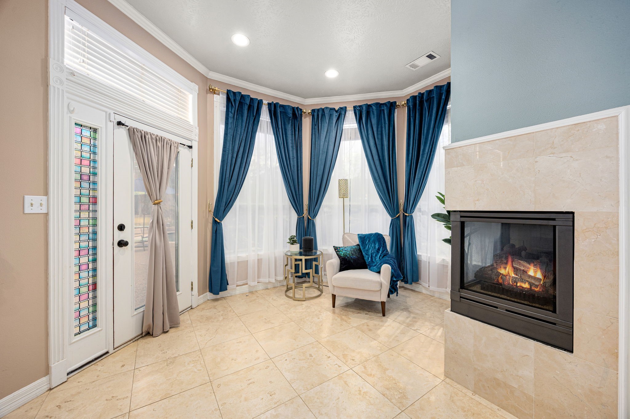 17511 Hawkin Lane Tomball, TX 77377 - Photo 21 of 50 a living room with furniture and a fireplace