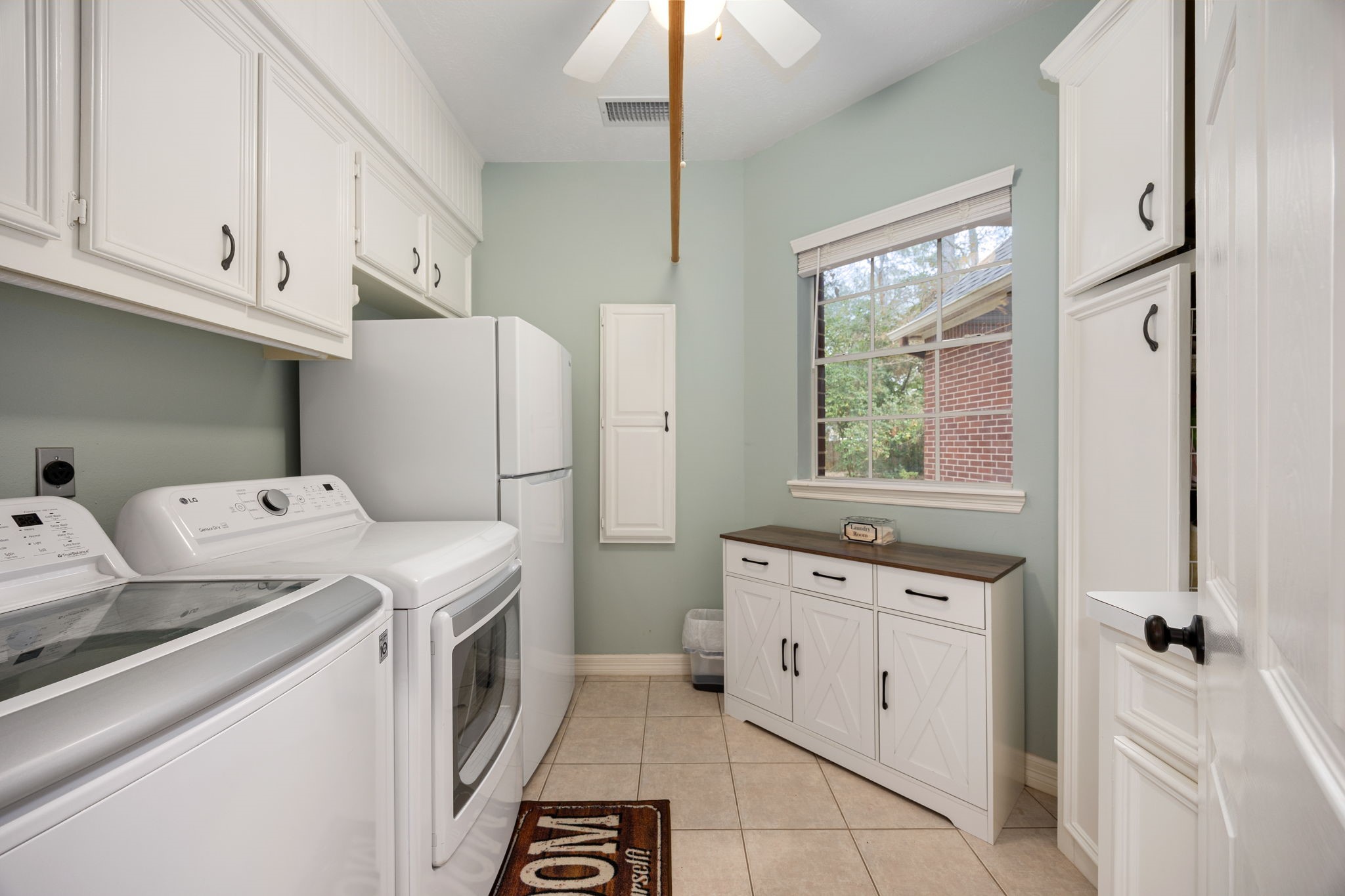 17511 Hawkin Lane Tomball, TX 77377 - Photo 25 of 50 a utility room with sink dryer and washer