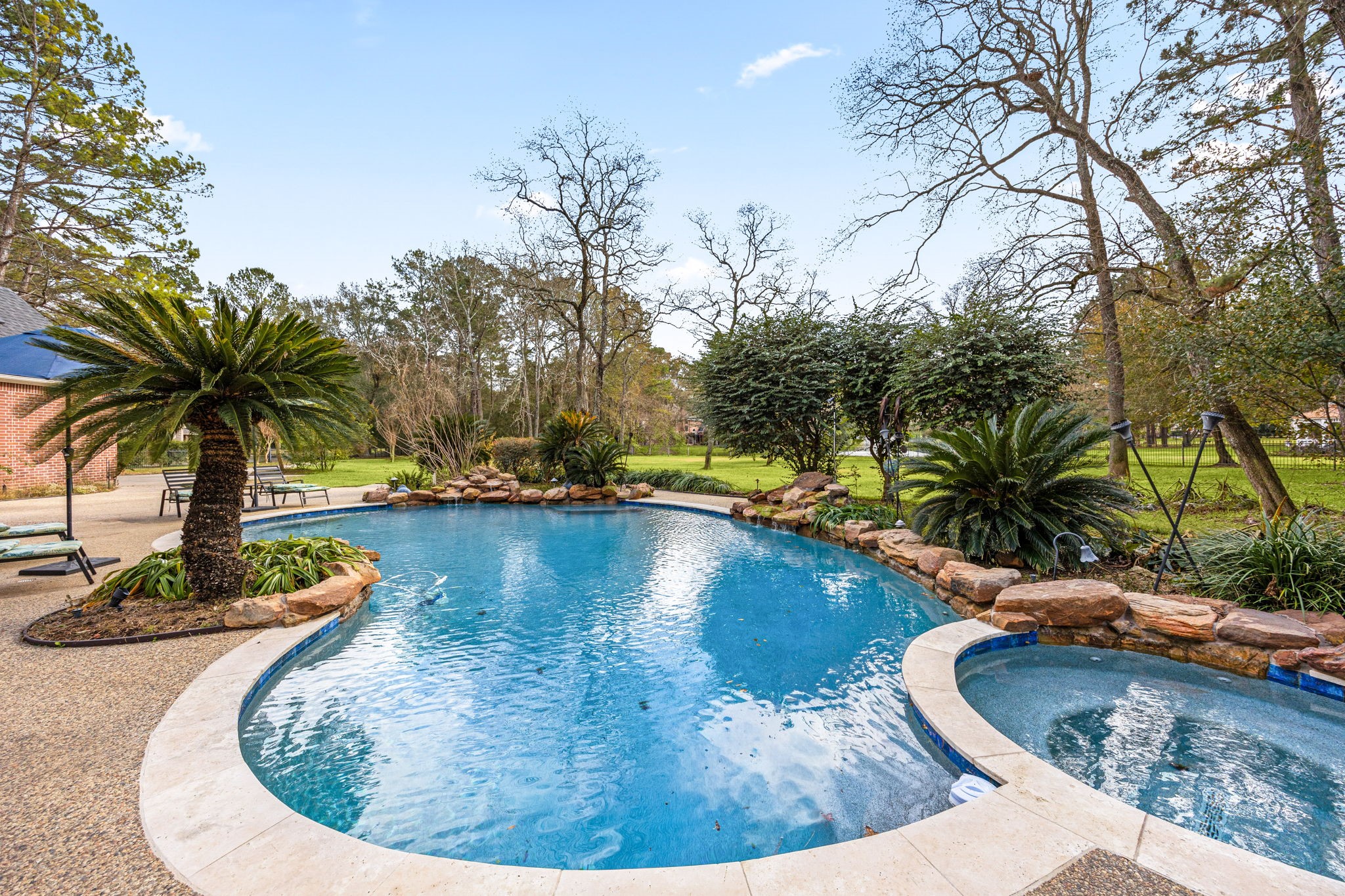 17511 Hawkin Lane Tomball, TX 77377 - Photo 44 of 49 a view of a swimming pool with an outdoor space