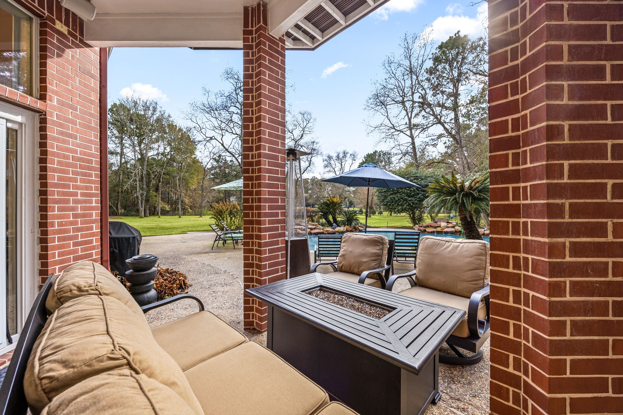 17511 Hawkin Lane Tomball, TX 77377 - Photo 46 of 50 a view of a patio with a yard