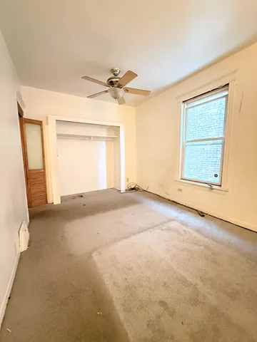 a kitchen with stainless steel appliances kitchen island granite countertop a sink and cabinets