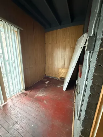 a view of parking garage with cars