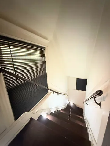 a kitchen with a stove a refrigerator and a sink