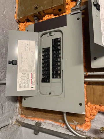 a front view of a building with a yard