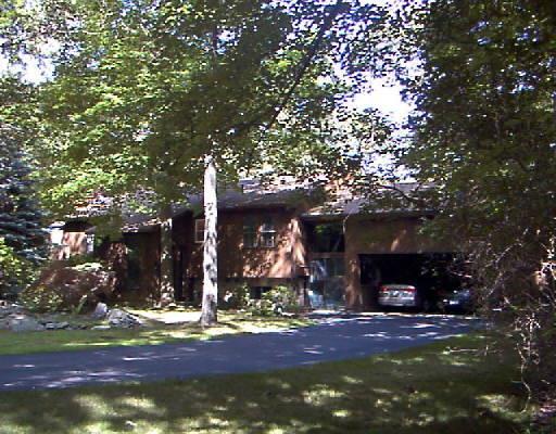 36 Topcrest Lane Ridgefield, CT 06877 - Photo 1 of 1 a view of a house with a tree and yard