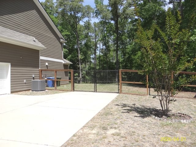 13733 Macon Road Upatoi, GA 31829 - Photo 2 of 27 a view of a backyard that has a tree