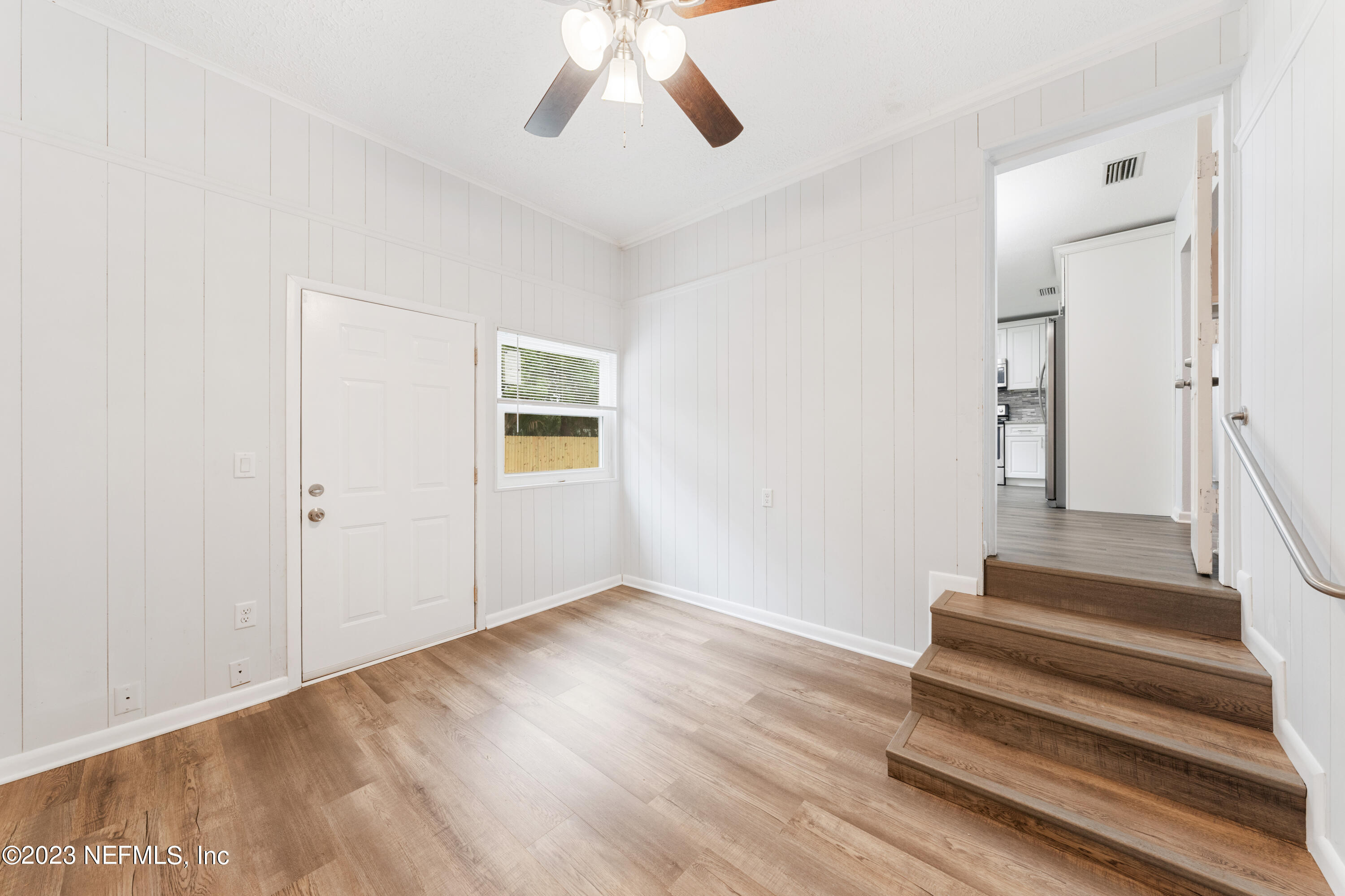 2704 Devonwood Road Jacksonville, FL 32211 - Photo 25 of 31 a view of an entryway with wooden floor