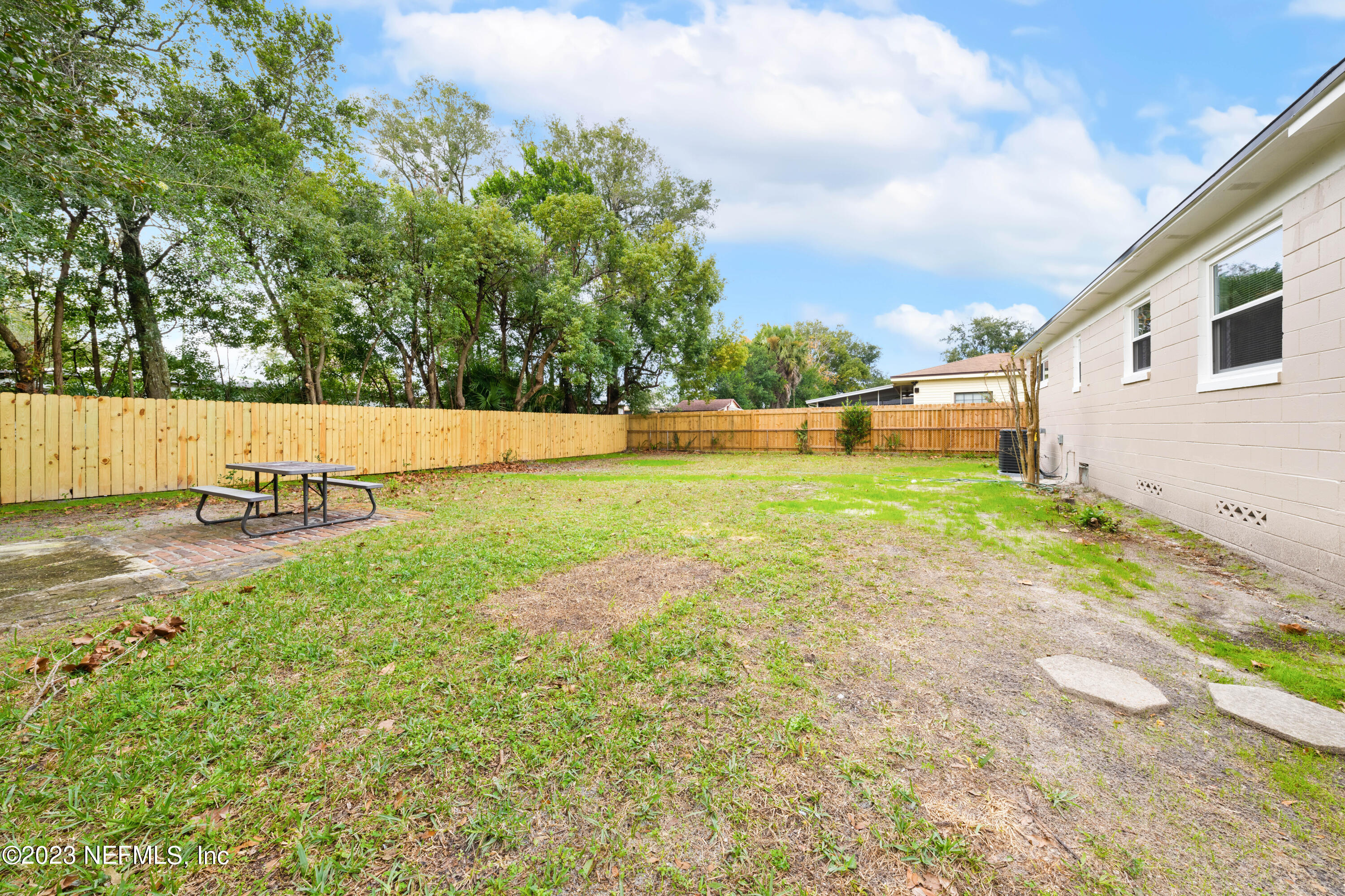 2704 Devonwood Road Jacksonville, FL 32211 - Photo 30 of 31 a view of a backyard with large trees