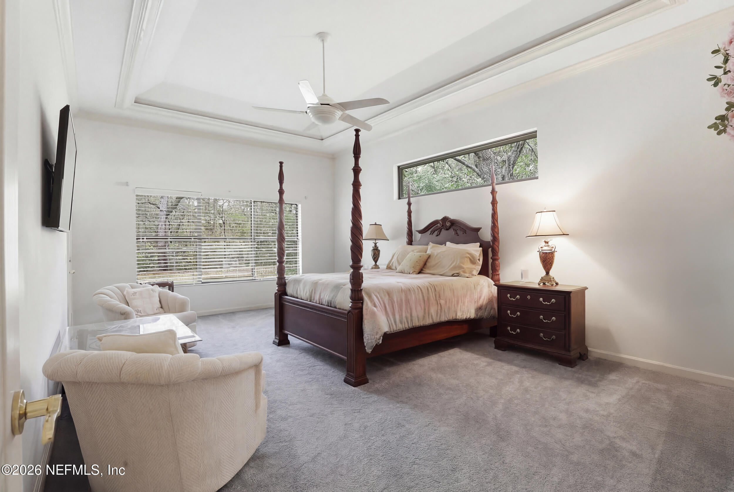 6455 Brooklyn Bay Road Keystone Heights, FL 32656 - Photo 20 of 50 a bedroom with a bed and a couch