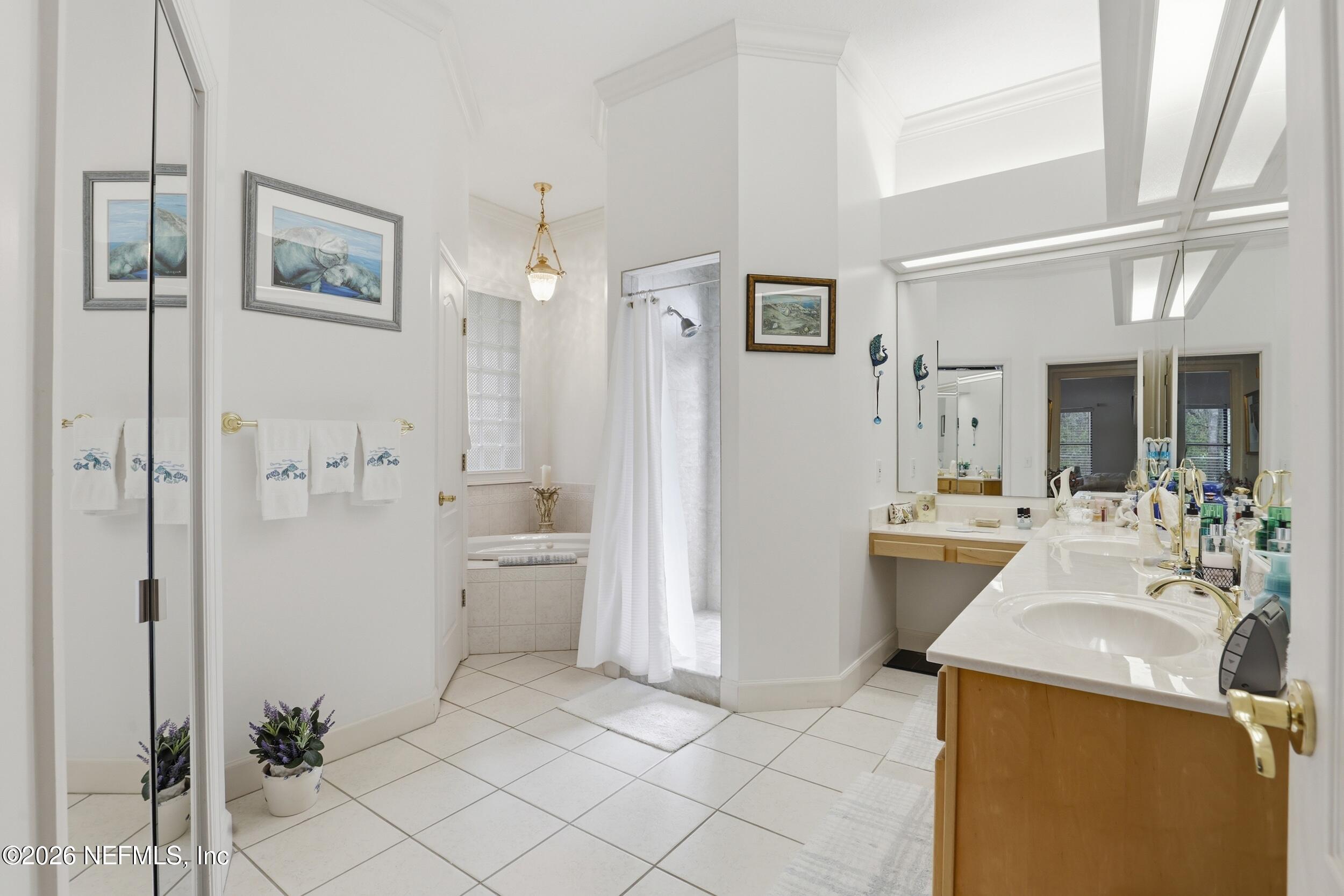 6455 Brooklyn Bay Road Keystone Heights, FL 32656 - Photo 22 of 50 a bathroom with a sink a toilet and shower