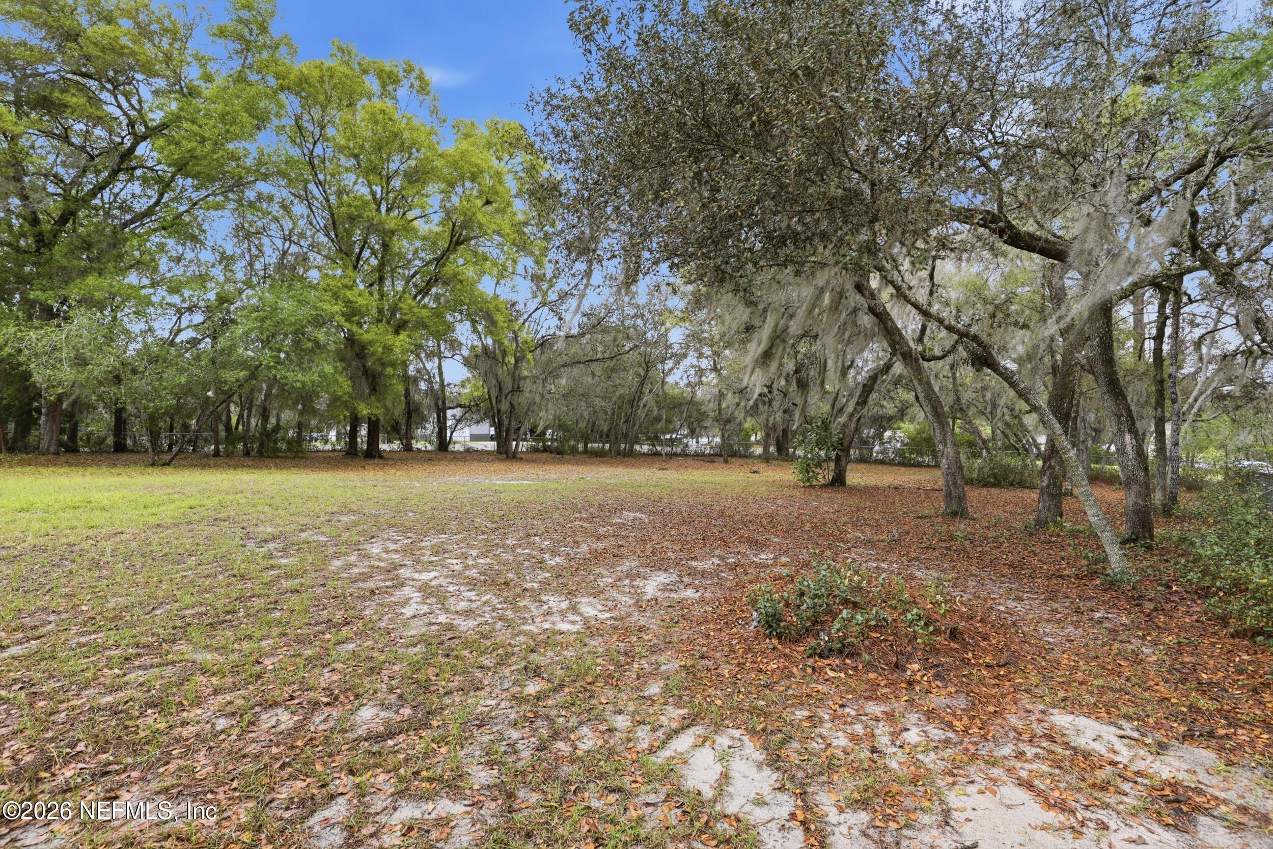 6455 Brooklyn Bay Road Keystone Heights, FL 32656 - Photo 36 of 50 a view of outdoor space with deck and yard