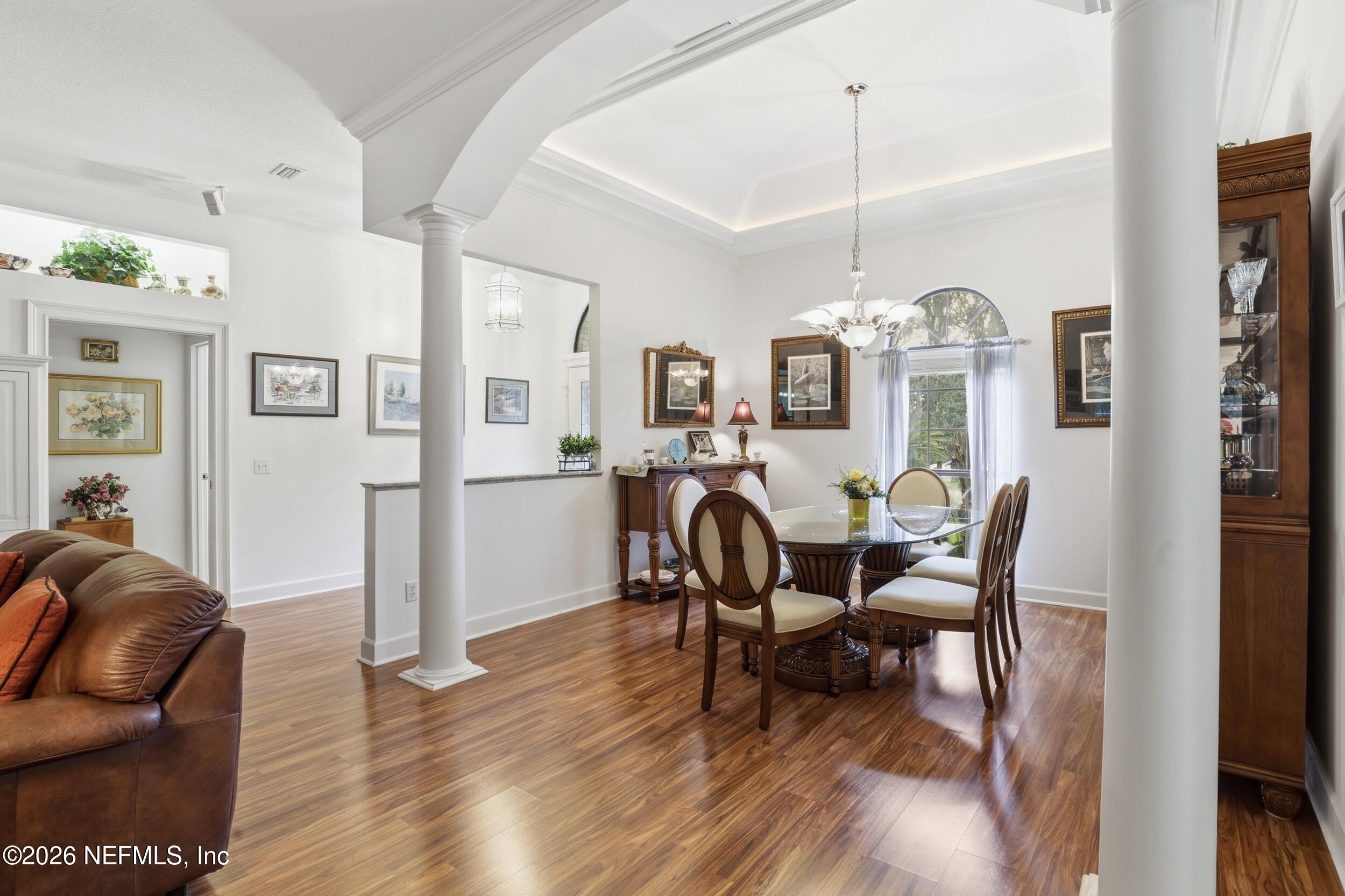 6455 Brooklyn Bay Road Keystone Heights, FL 32656 - Photo 5 of 50 a view of a dining room with furniture window and wooden floor