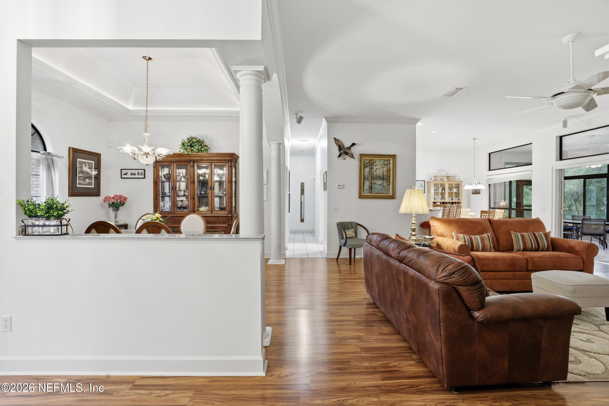 6455 Brooklyn Bay Road Keystone Heights, FL 32656 - Photo 6 of 50 a living room with furniture and wooden floor