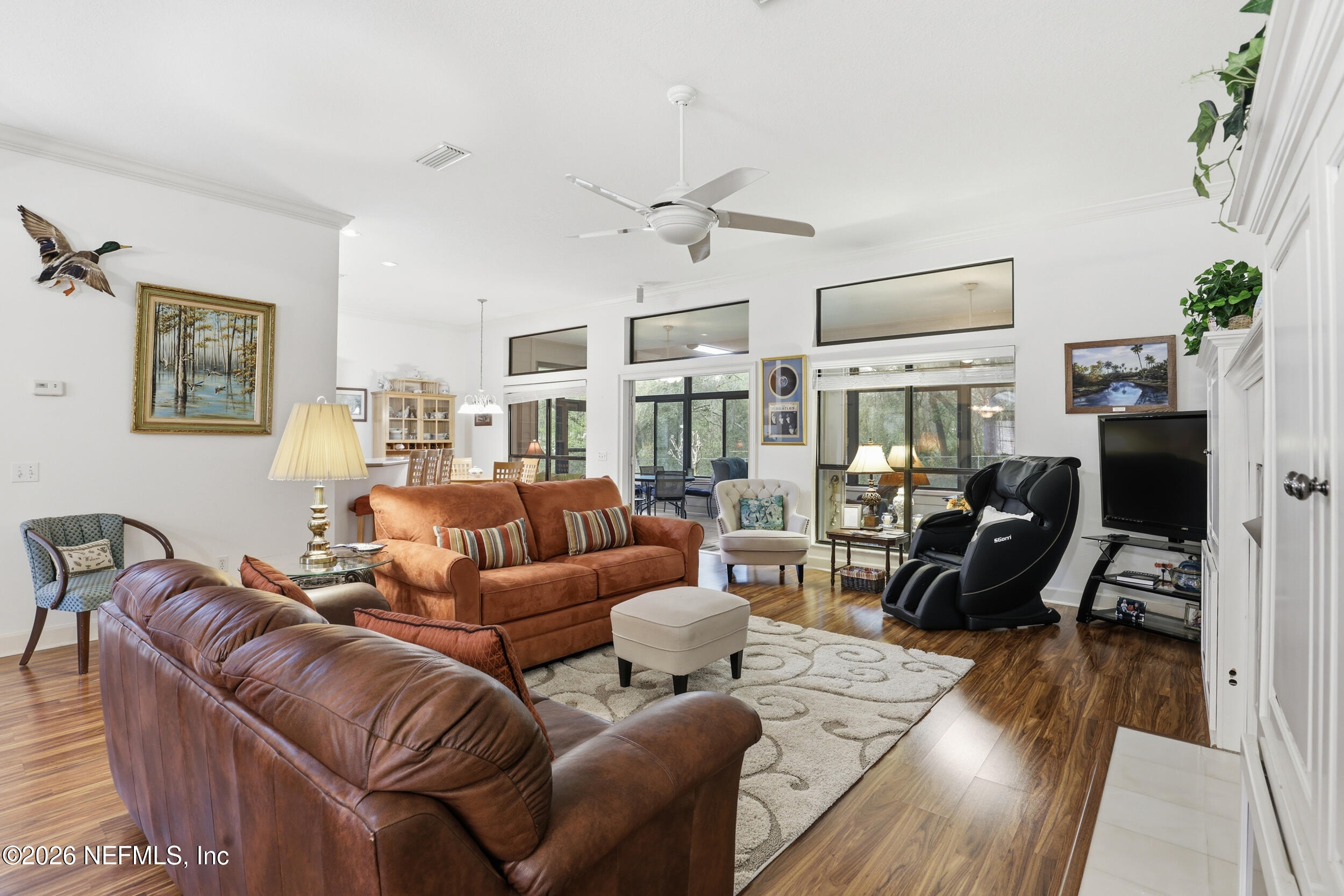 6455 Brooklyn Bay Road Keystone Heights, FL 32656 - Photo 8 of 50 a living room with furniture or couch and a wooden floor
