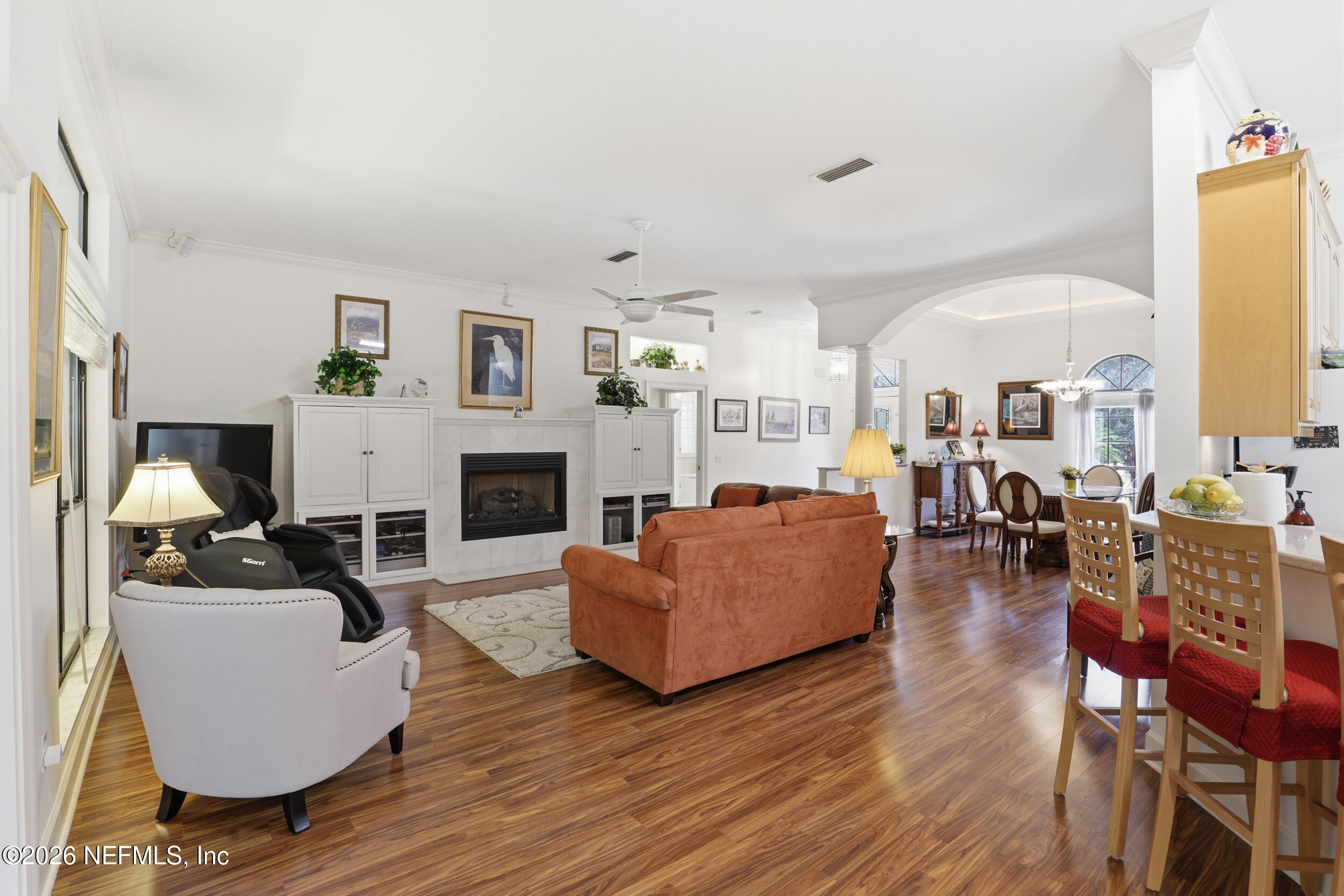 6455 Brooklyn Bay Road Keystone Heights, FL 32656 - Photo 9 of 50 a living room with furniture fireplace and a large window