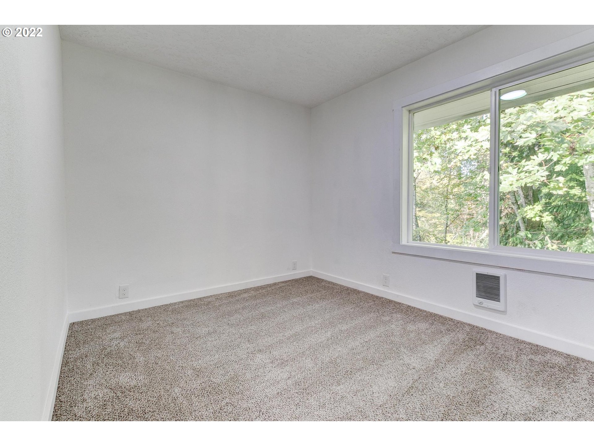 33719 Bennett Road Warren, OR 97053 - Photo 11 of 32 a view of an empty room and window