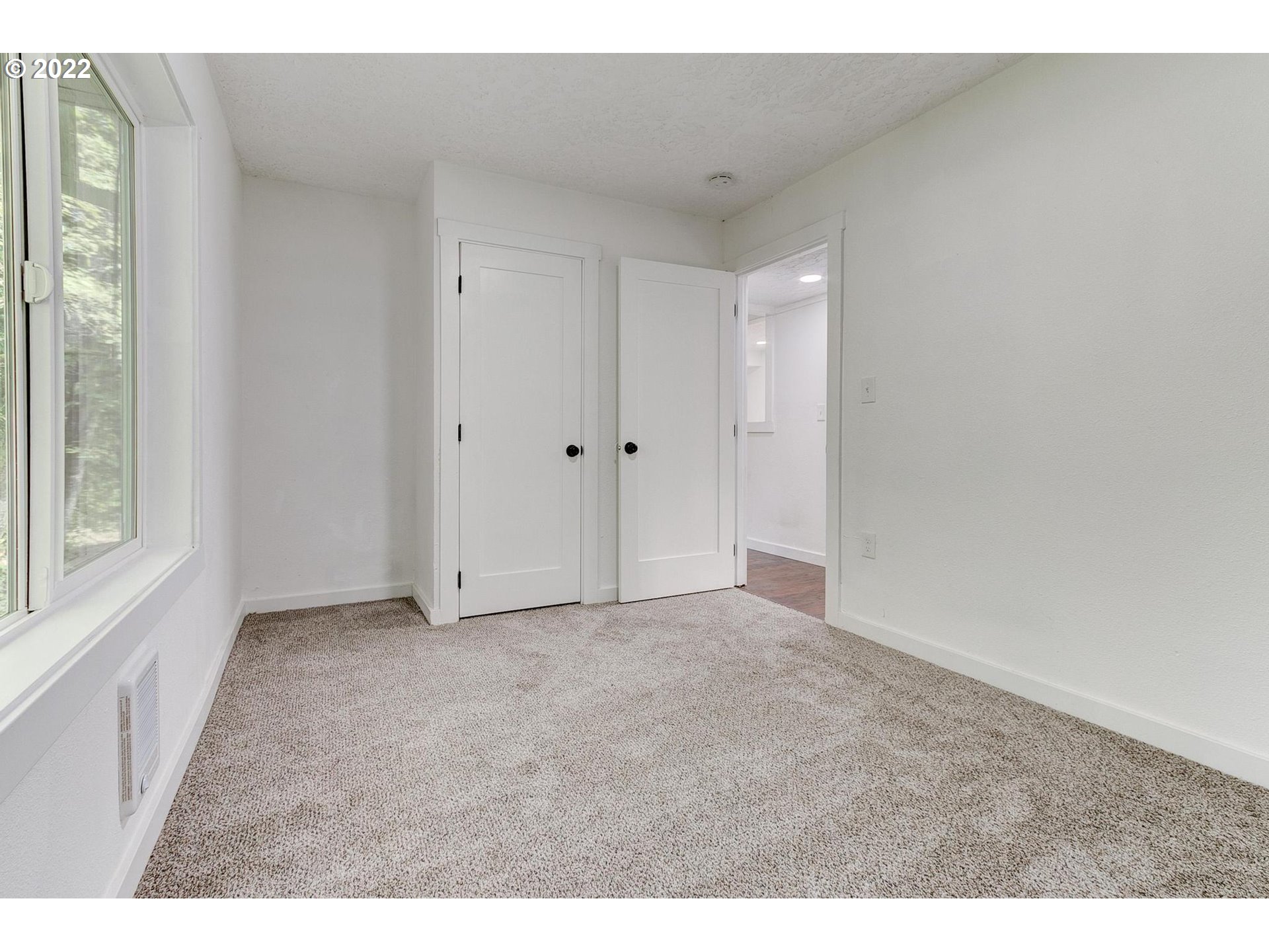 33719 Bennett Road Warren, OR 97053 - Photo 12 of 32 a view of an empty room and a window