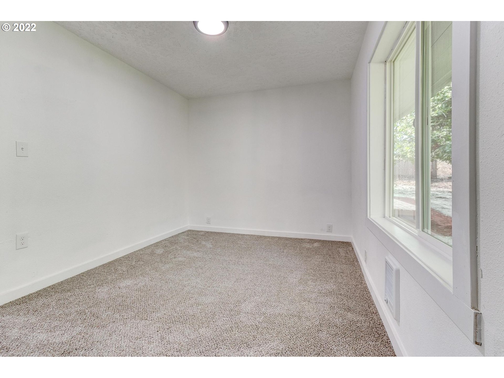 33719 Bennett Road Warren, OR 97053 - Photo 13 of 32 a view of an empty room and window