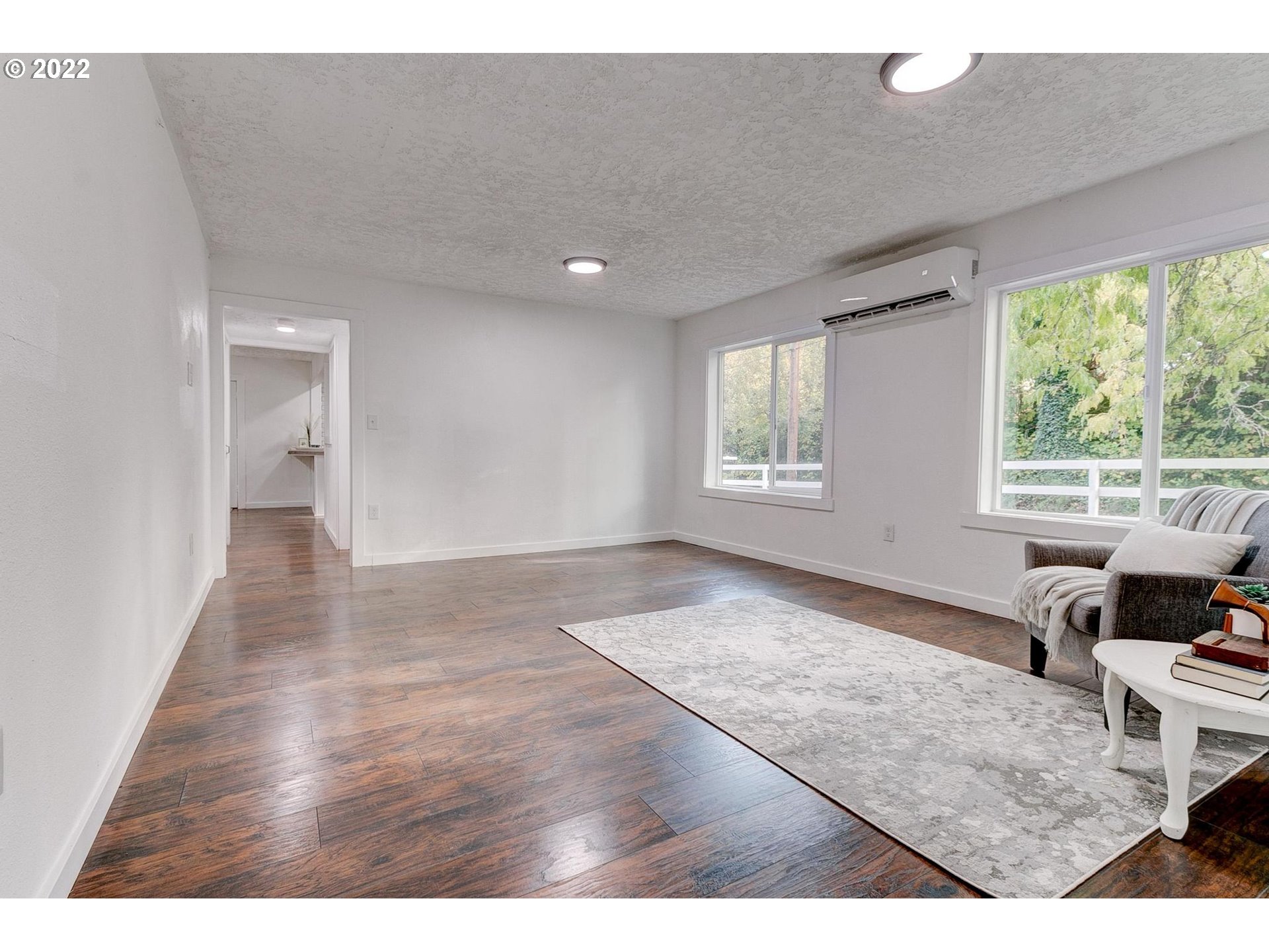 33719 Bennett Road Warren, OR 97053 - Photo 16 of 32 a view of livingroom with hardwood floor and a window