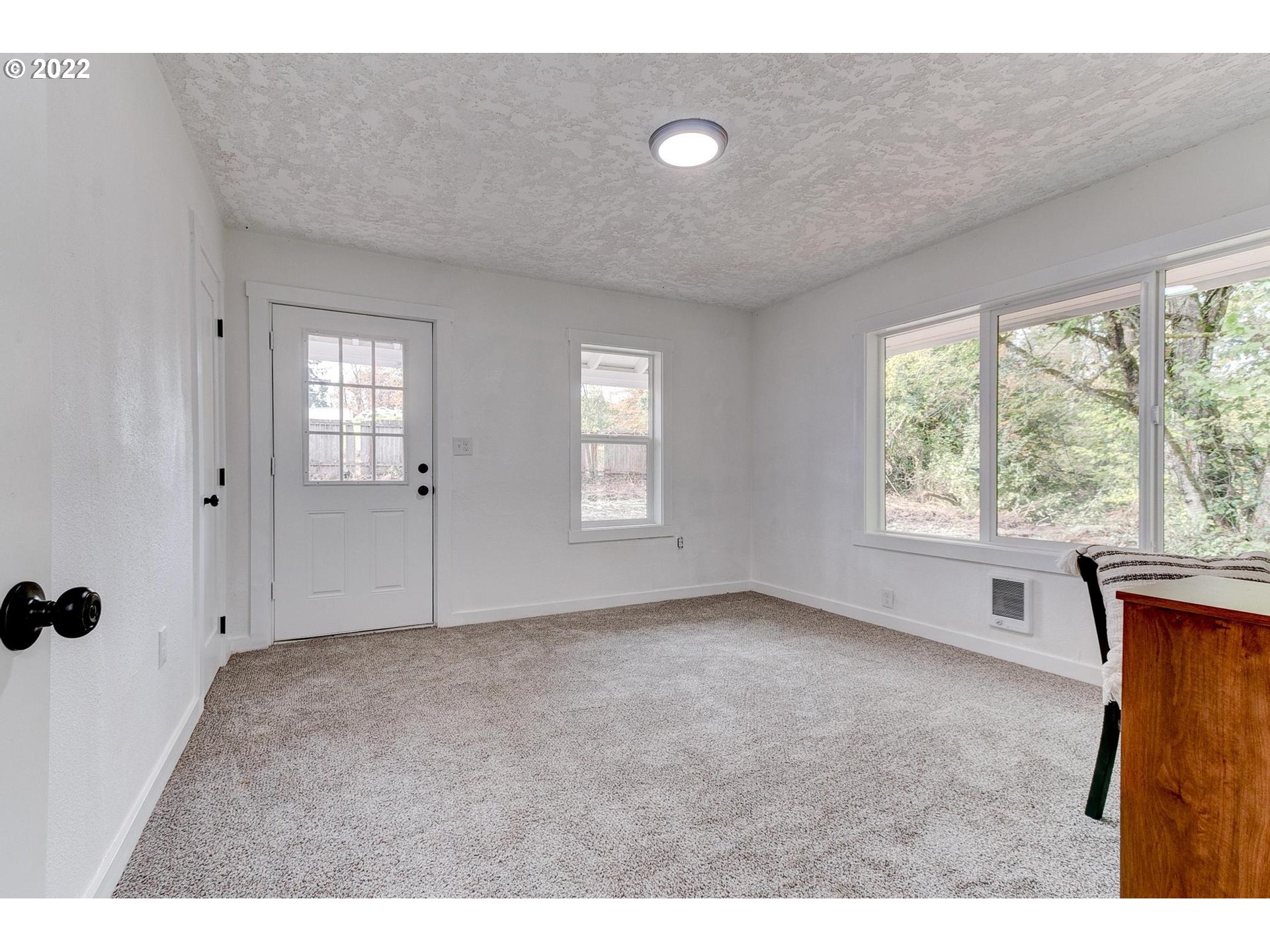 33719 Bennett Road Warren, OR 97053 - Photo 18 of 32 a view of an empty room with a window