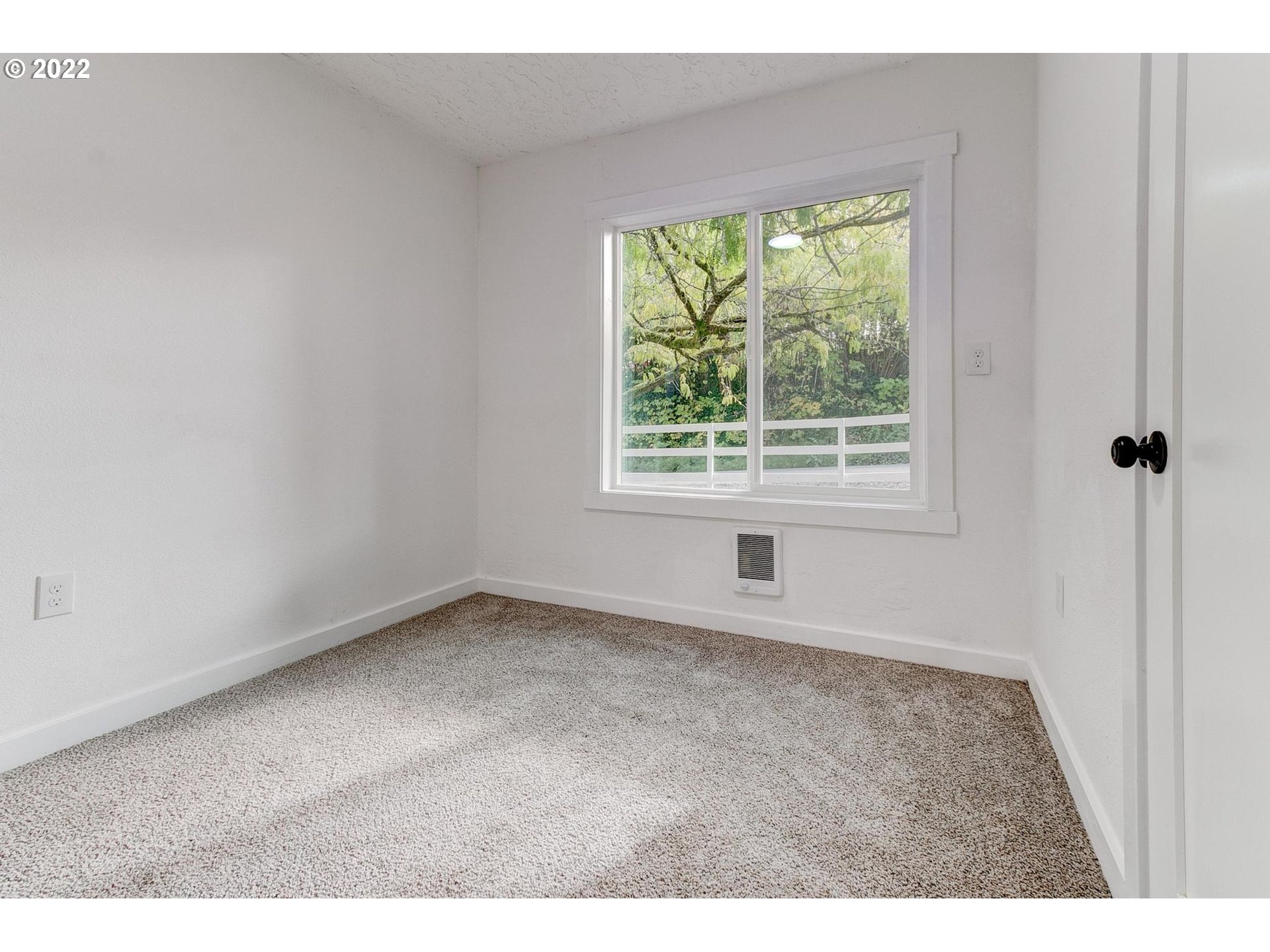 33719 Bennett Road Warren, OR 97053 - Photo 21 of 32 a view of an empty room with a window