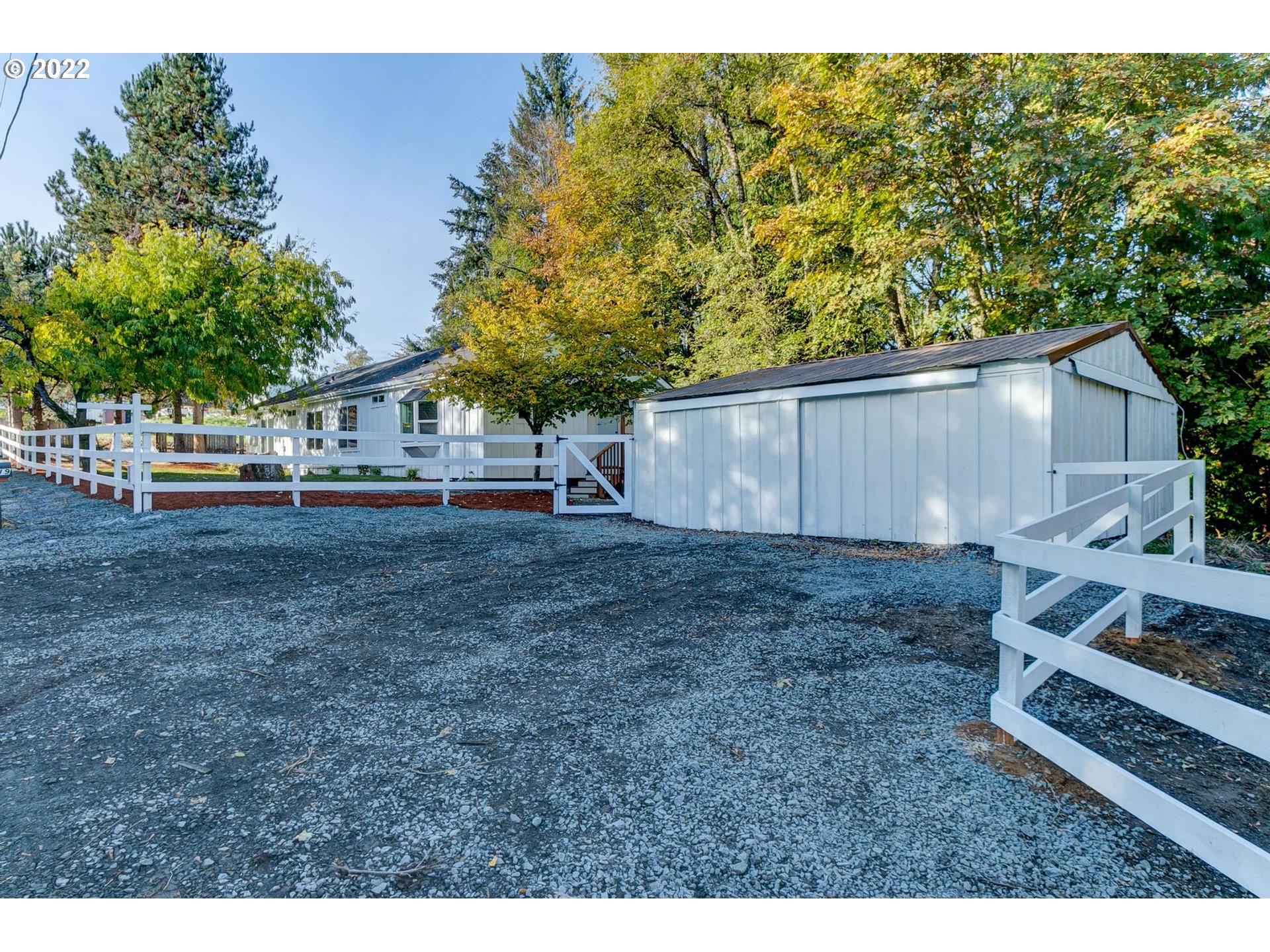 33719 Bennett Road Warren, OR 97053 - Photo 24 of 32 a backyard of a house with barbeque oven table and chairs