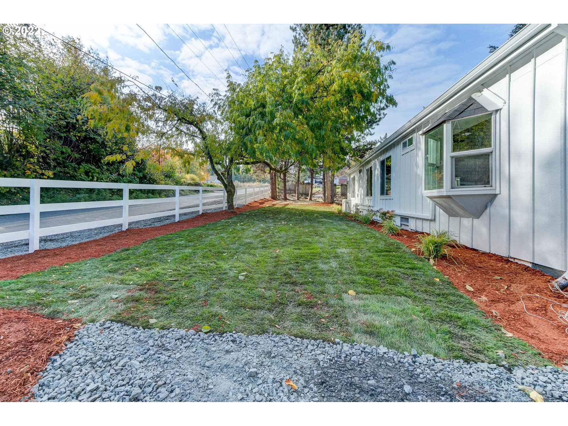 33719 Bennett Road Warren, OR 97053 - Photo 28 of 32 a view of a backyard with a garden