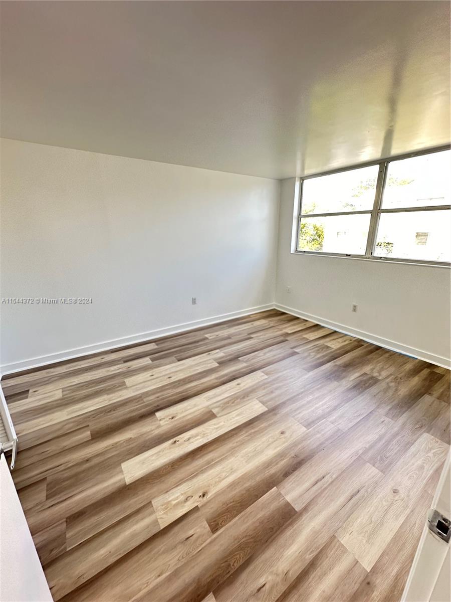 Nirvana Condominiums Miami, FL 33138 - Photo 4 of 13 a view of empty room with window
