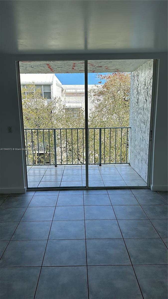 Nirvana Condominiums Miami, FL 33138 - Photo 9 of 13 a view of an empty room and window